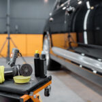 Equipment for automotive body polishing Professional equipment for automotive body polishing at the car service. Car detailing tools for vehicle care